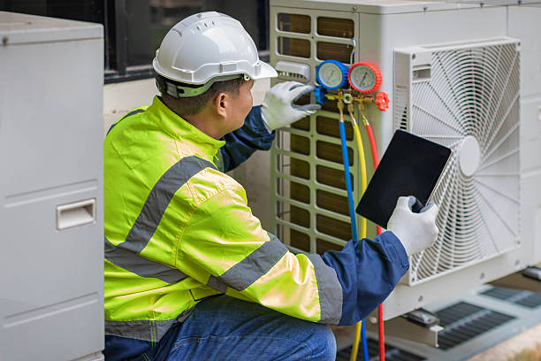 Professional Hvac technician working in Apulia Station, NY